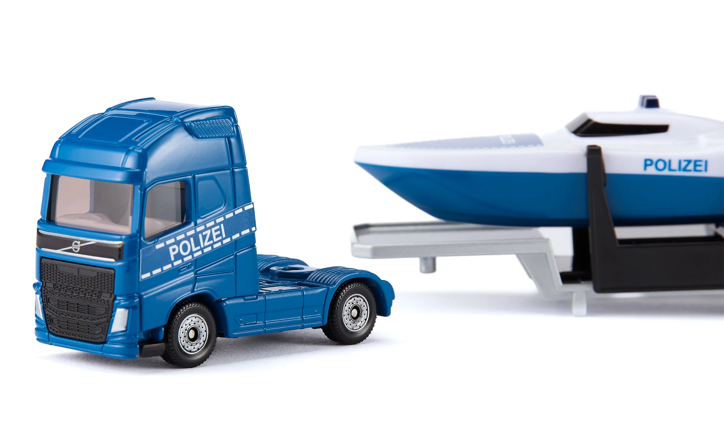 SIKU CAMION VOLVO CON BARCA 1757