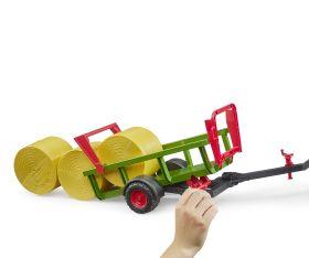 BRUDER RIMORCHIO CON 3 BALLE DI FIENO ROTONDE 2204